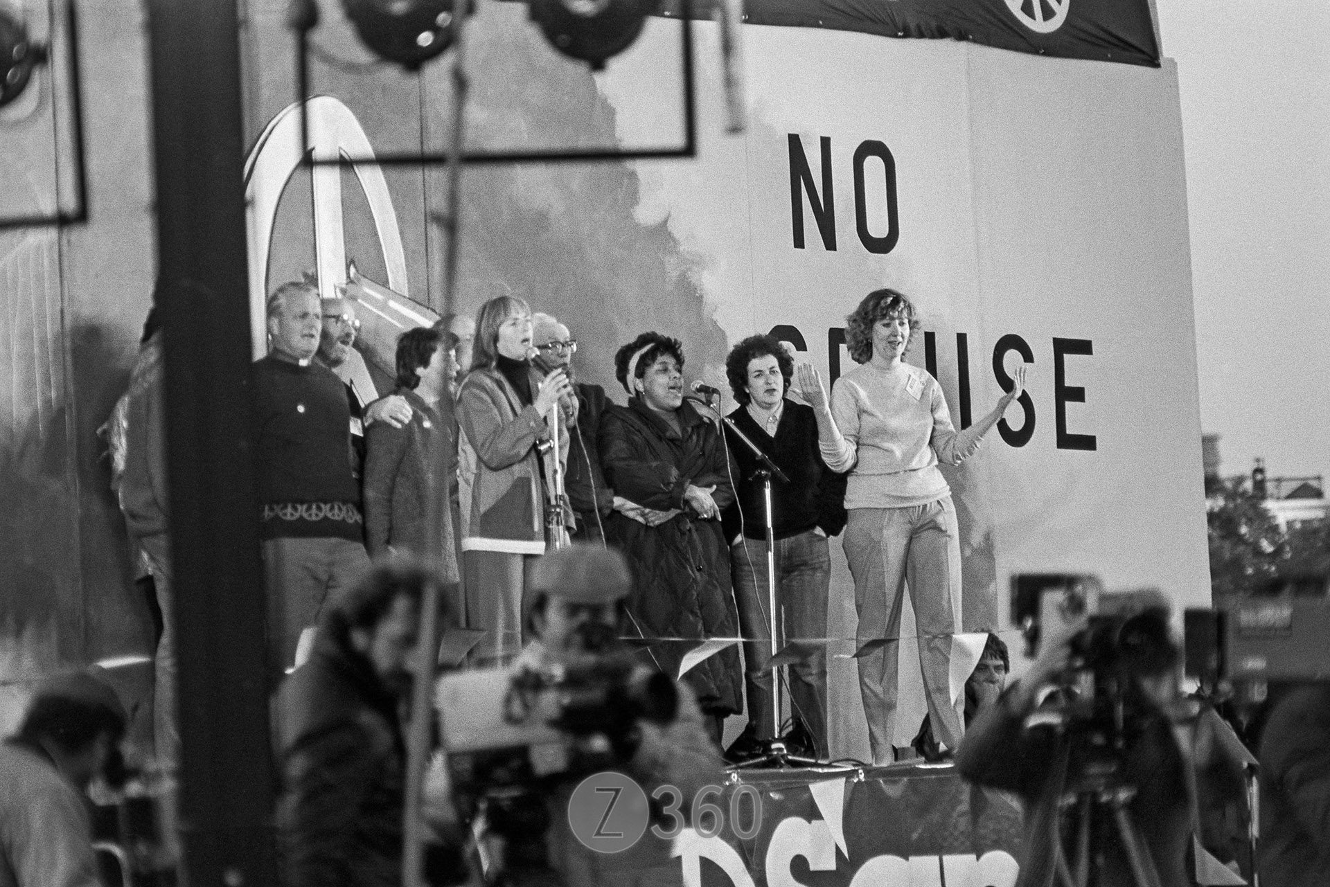 Michael Foot, in the background