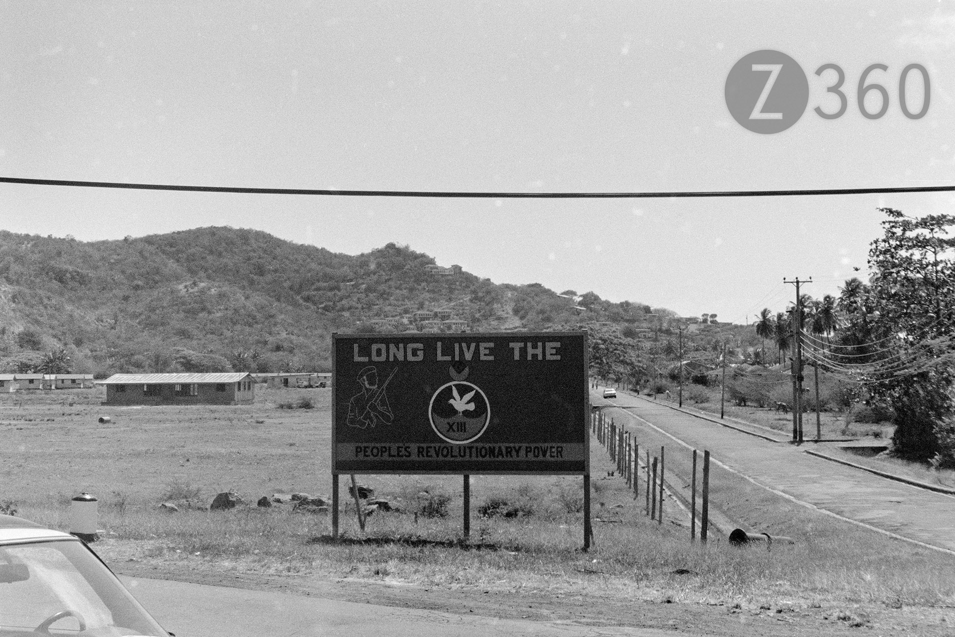 We were housed in the field behind the billboard