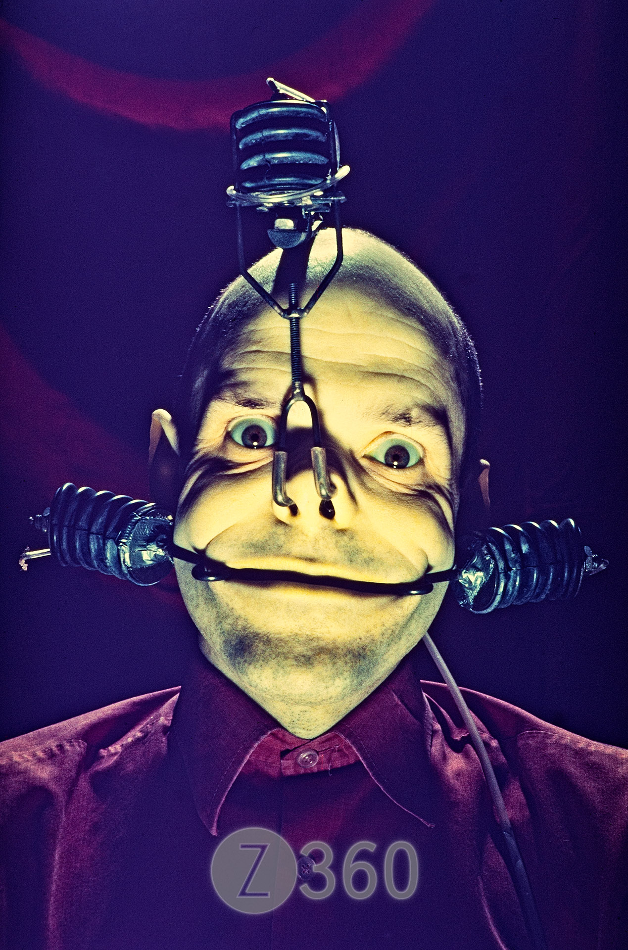 Andrew Bailey wearing Jim Whiting's Smile Machine
