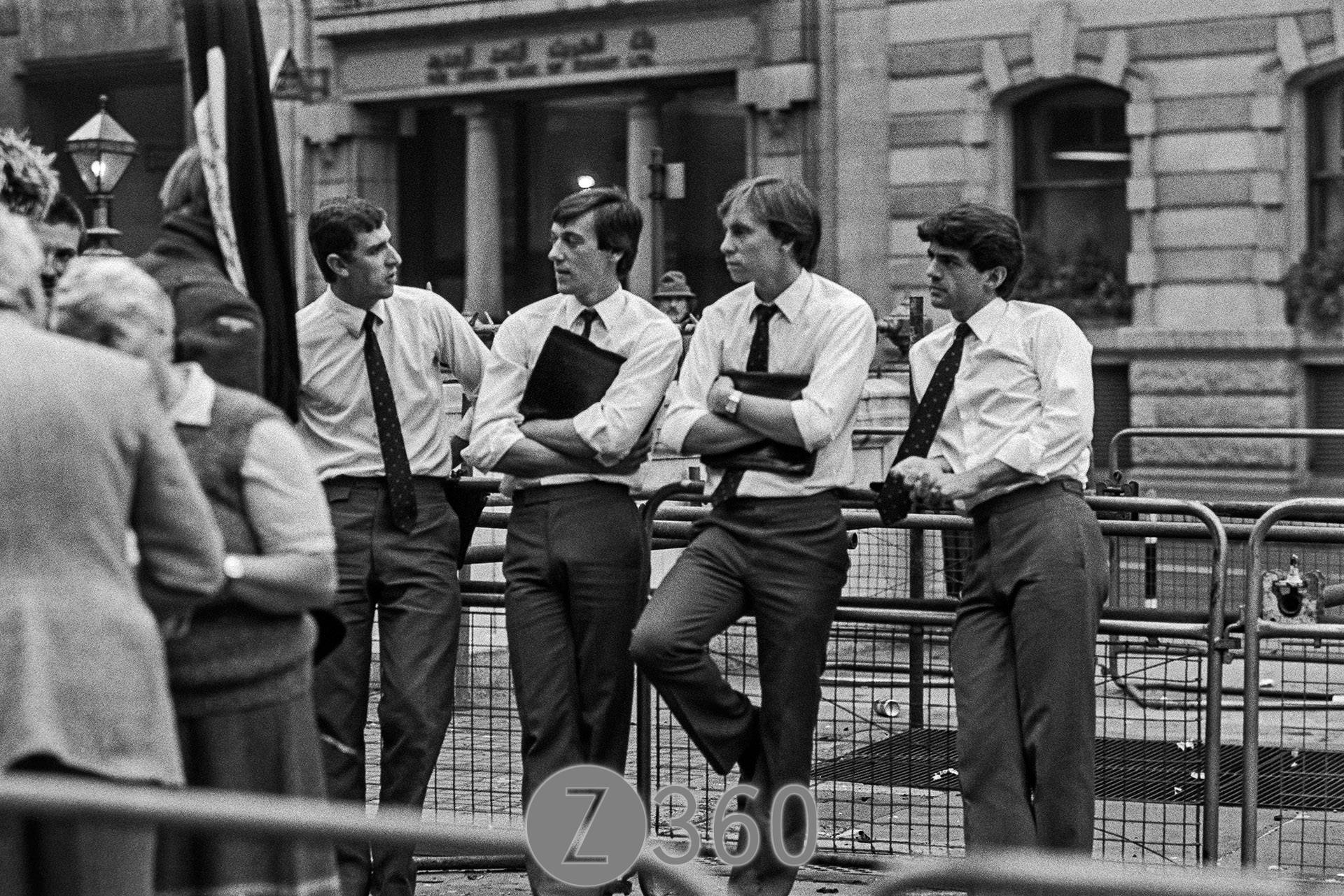 Spectators from street level