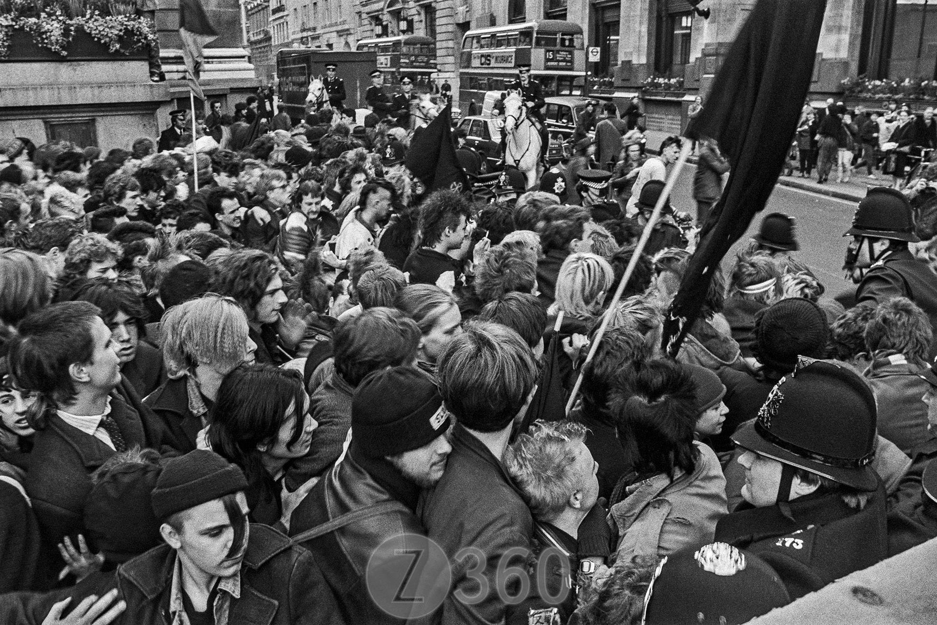 Crowd attempt to break through the cordon