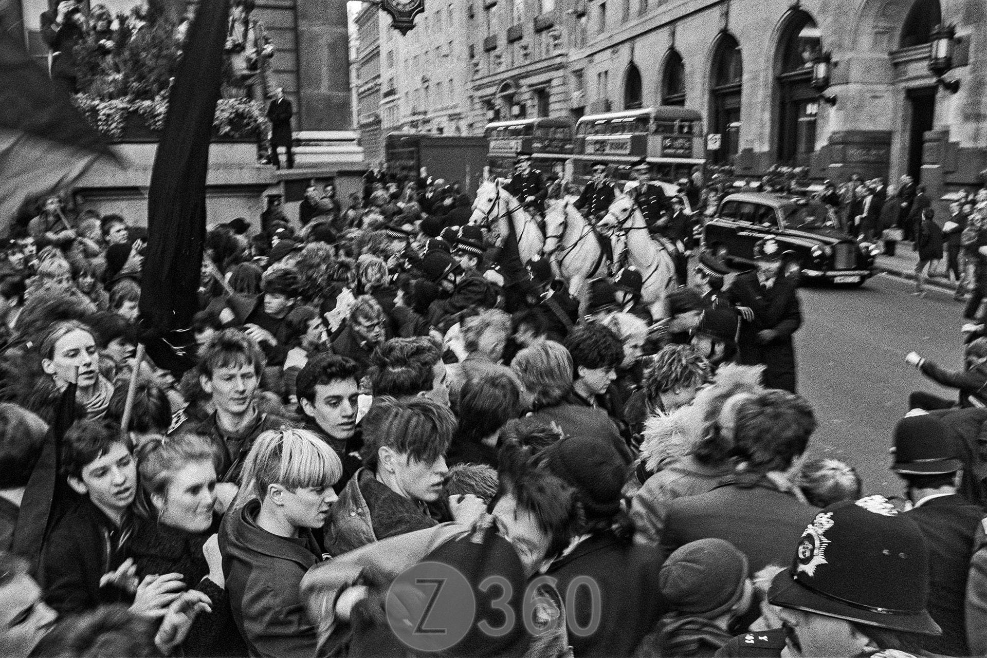Crowd attempt to break through the cordon